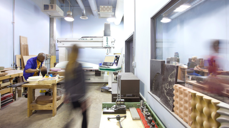 Furniture design student working in CNC lab at Gulfstream Center for Design
