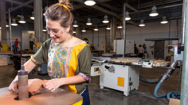 Industrial design student Carol Pieters in the workshop
