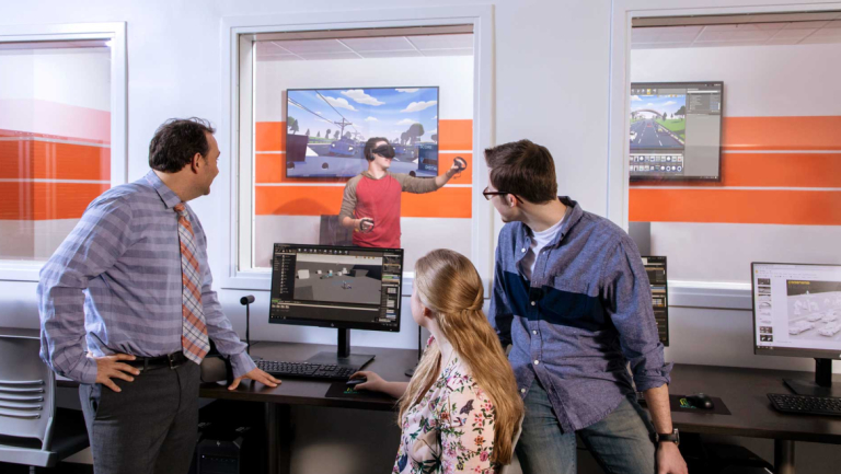 Students and a professor conduct usability tests in the user experience lab located in The Shed in Savannah