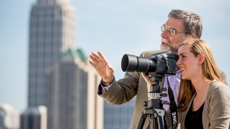 Photography professor instructing student Photography student shooting with professor on SCAD Atlanta rooftop