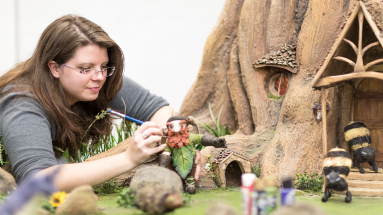 Production design student painting set model