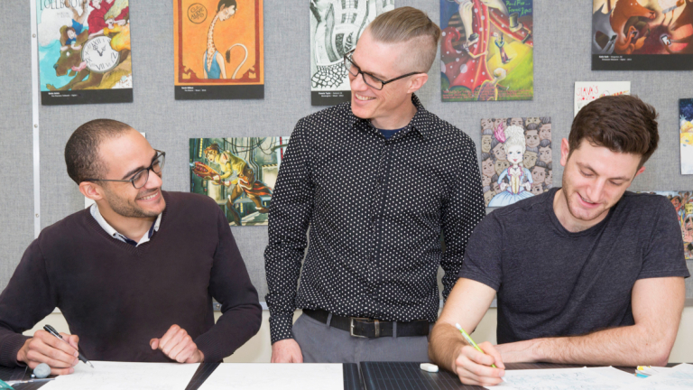 Sequential art professor John Larison works with SCAD students