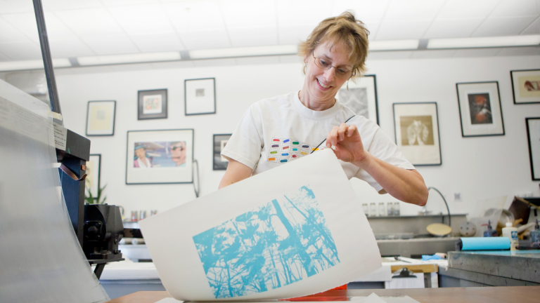 Educator programs participant Educators Programs participant working in printmaking lab