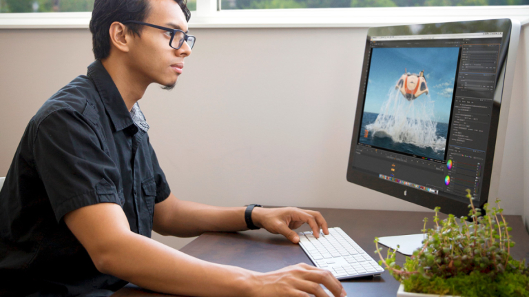 Visual effects student works at a computer at SCAD Atlanta