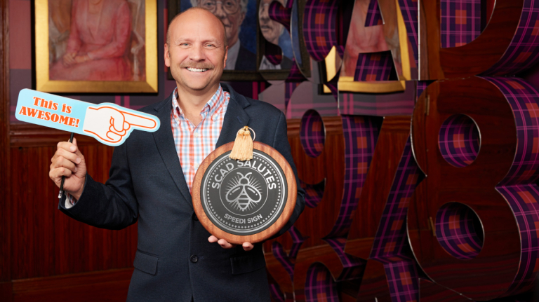 Flint North, owner and CEO of Speedi Sign, is recognized with the SCAD Salutes award