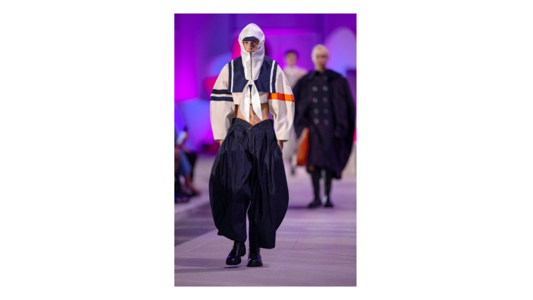 Model walking runway at SCAD fashion show