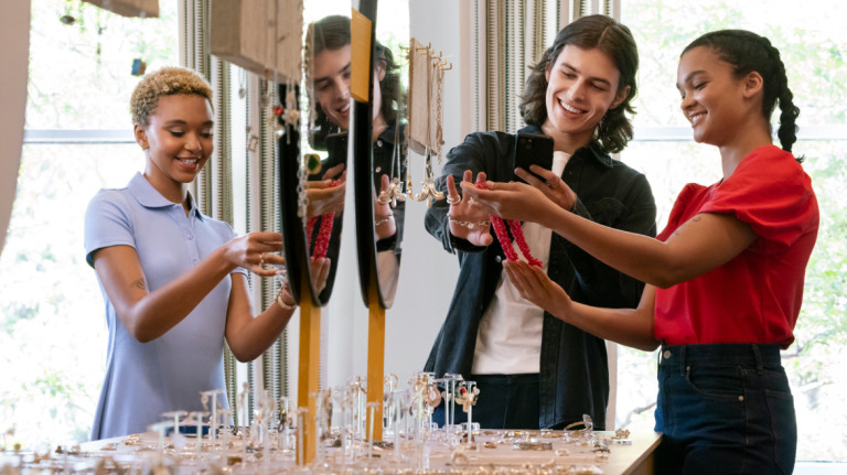 patrons looking at jewelry