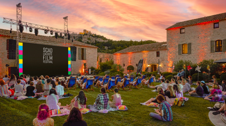 Lacoste film festival attendees at an outside screening