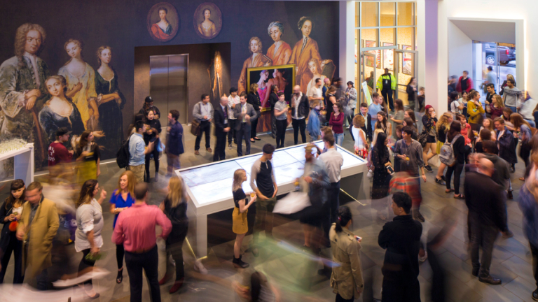 Reception crowd in lobby of SCAD Museum of Art 