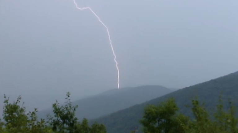 Lightening strikes a mountain 