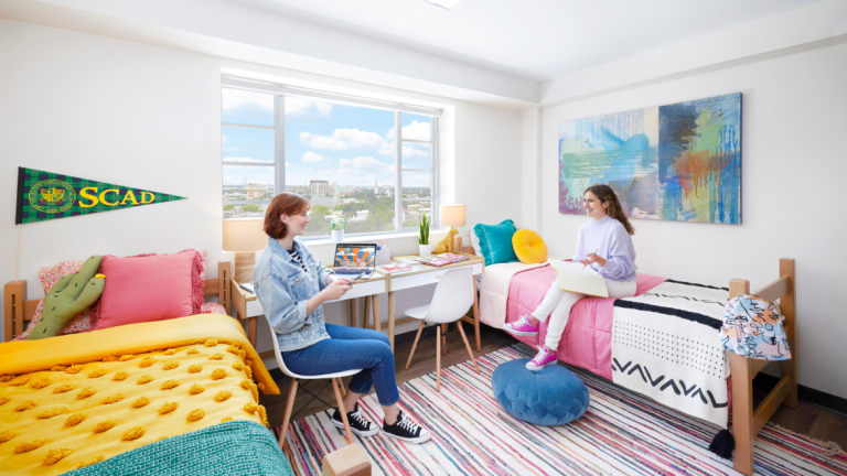 SCAD students hanging out in dorm room