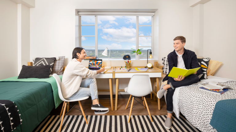 Students relaxing in dorm room