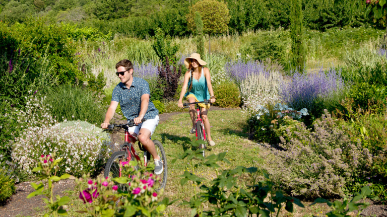 Students ride bikes at SCAD's serene Lacoste location