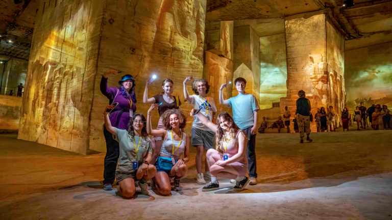 Student group taking images underground.