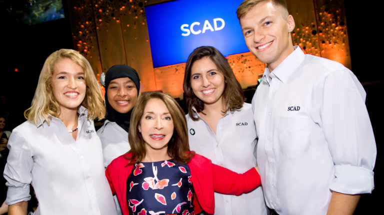 President Paula Wallace and students at orientation
