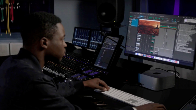SCAD graduate Tejumoluwa K. Olarewaju at sound board