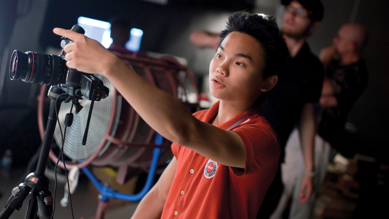 SCAD photography alumnus directing photo shoot