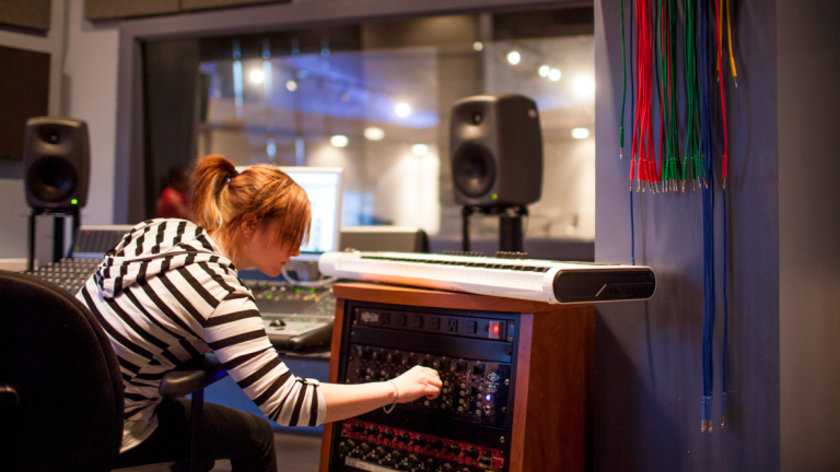 Sound design student working in the studio Sound design student working in Hamilton Hall studio