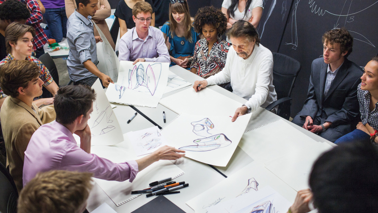 SCAD Style guest Luigi Colani reviewing designs in workshop with students
