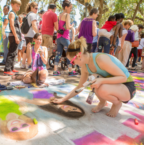 87331SCAD students creating chalk designs at Sidewalk Arts Festival