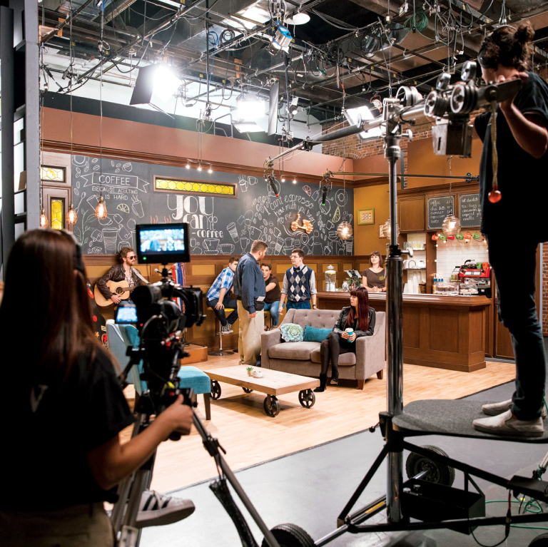 Performing arts students filming episode of The Buzz