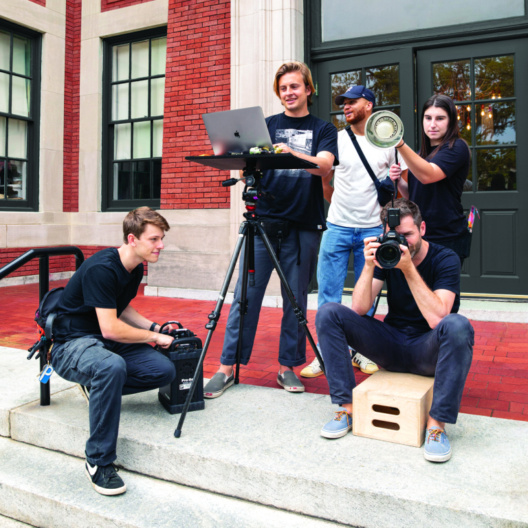 Photography students work on set
