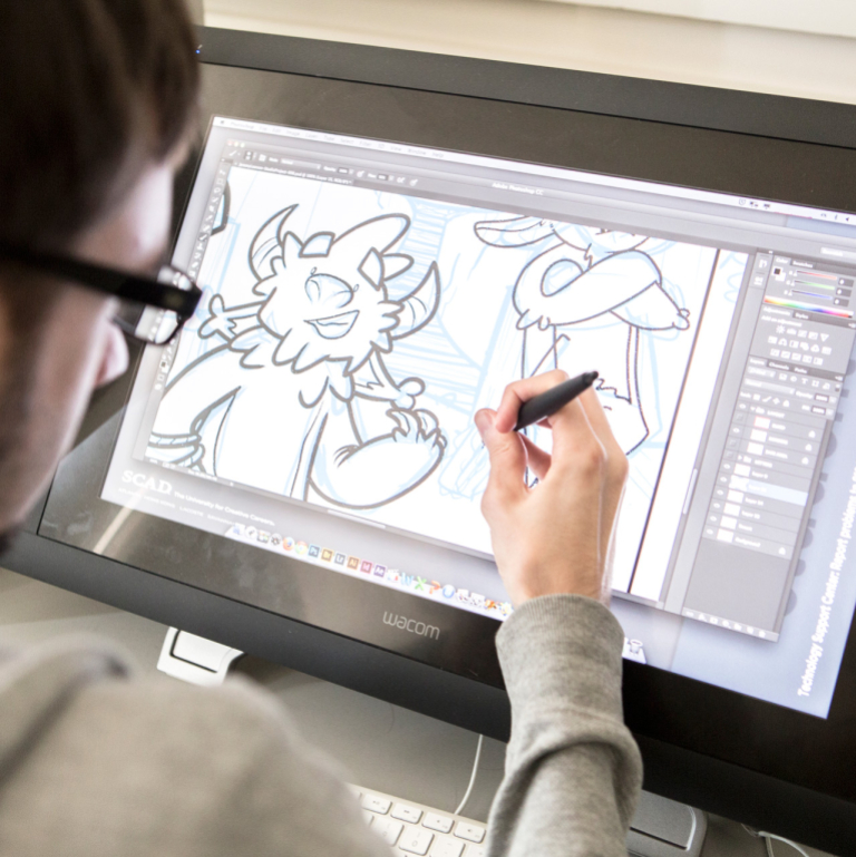 Sequential art student works on tablet
