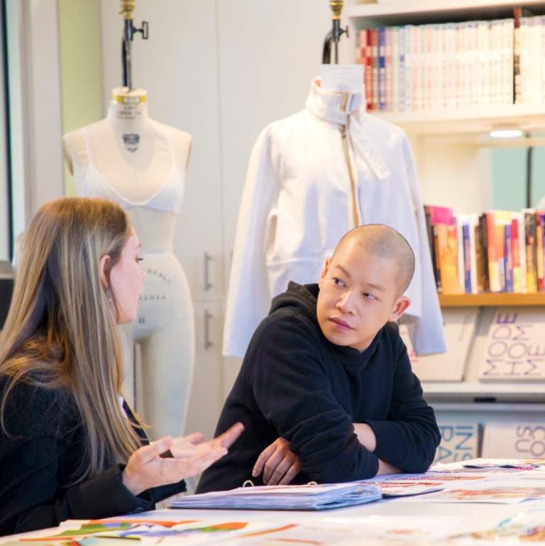 Designer Jason Wu instructs fashion student