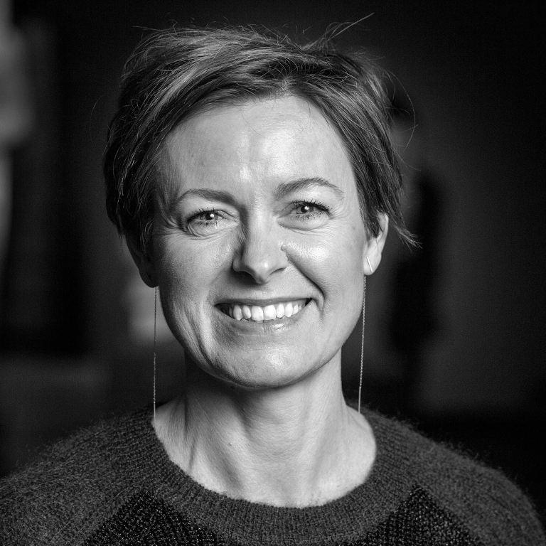 black and white portrait of Trine Sondergaard smiling