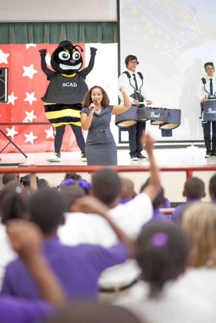 SCAD family entertain children at East Broad Elementary School during a SCAD Buzz Bus visit 