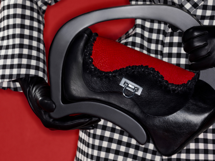 Black accessory bag by Aiden Kam